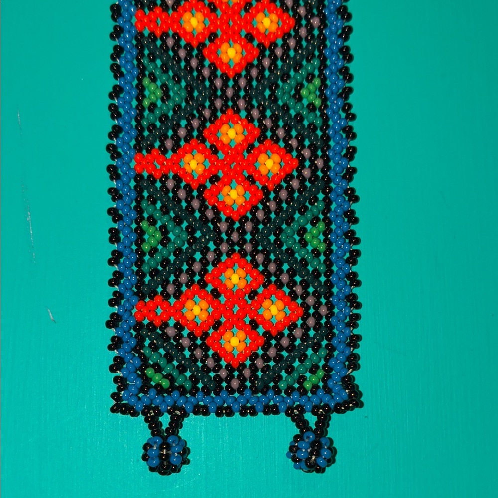 Handmade Beaded Bracelet with Orange and Blue Pattern